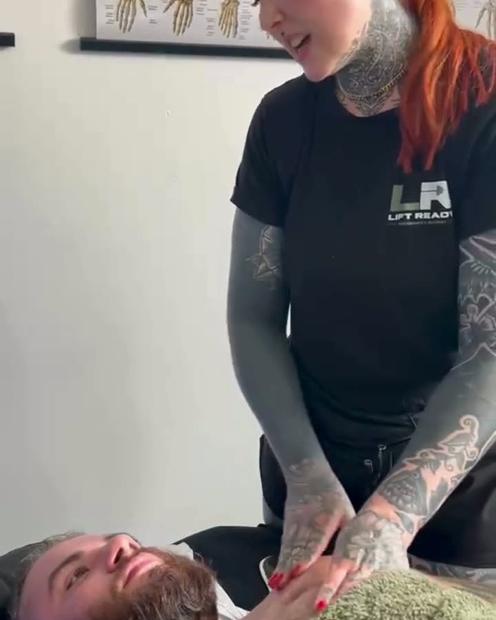 Reel frame: Summer explaining a technique mid-treatment.